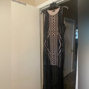 Elegant long black maxi dress with mesh detailing